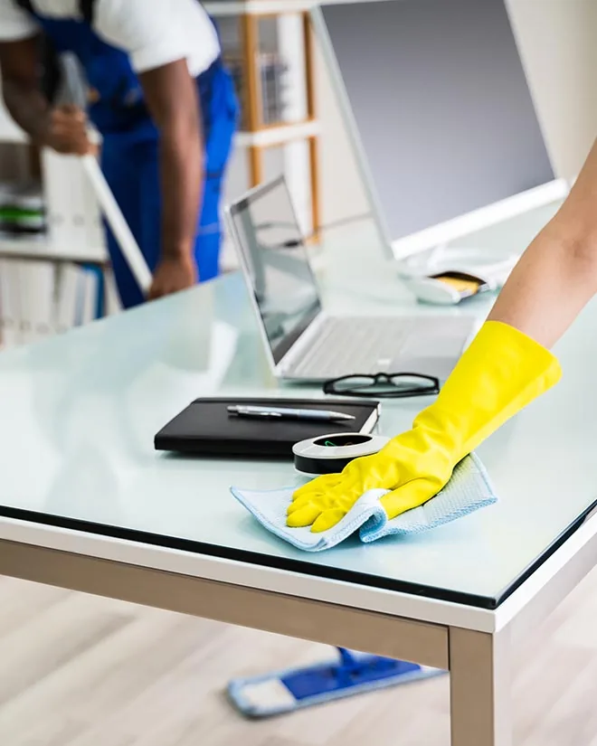 Day porter providing commercial cleaning in a modern office